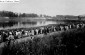 Women and Children from the Ghetto are Marched to the Daugava (Dvina) River to Bath. ©Ghetto Fighters' House